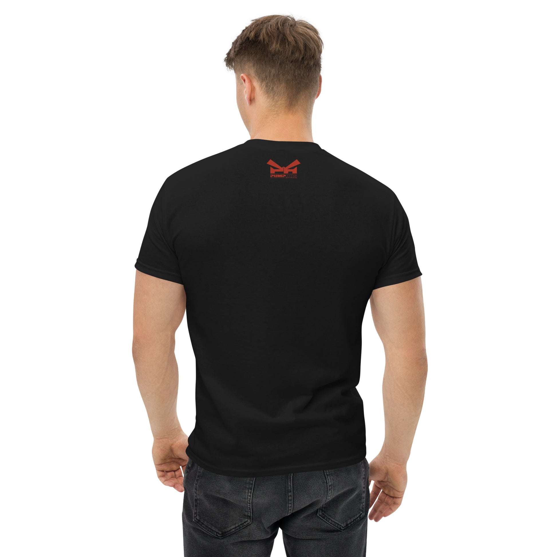 Back view of an athletic man wearing a black t-shirt with the Pumpous Apparel logo in red under the neckline