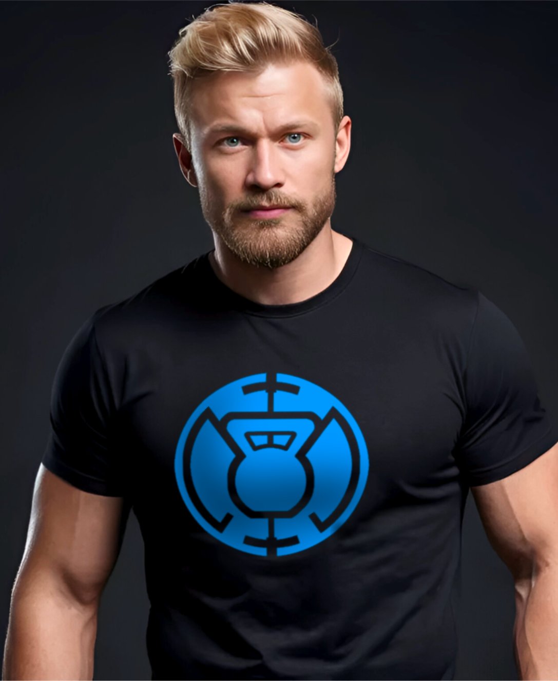 Front view of a muscular man in the Blue Kettlebell black t-shirt by Pumpous Apparel, showing a design in blue inspired by DC Comics' Blue Lantern Corps logo featuring a kettlebell at the center.