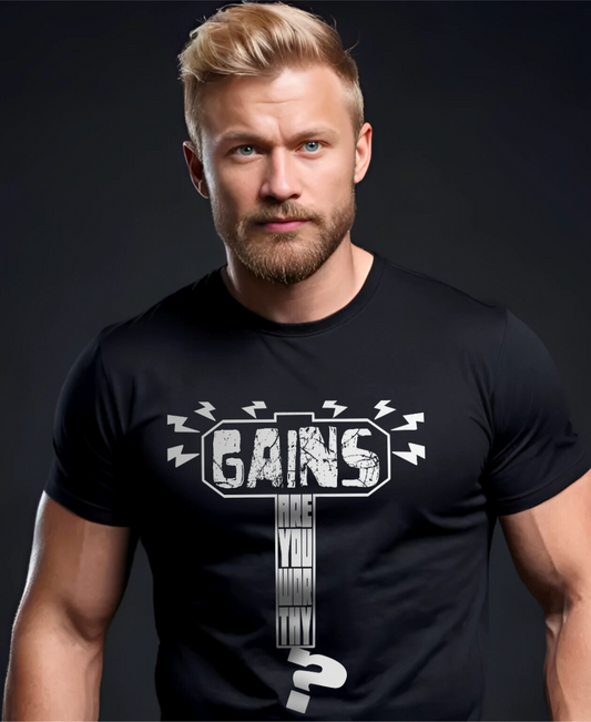 Athletic man wearing Thor inspired fitness themed t-shirt which reads: "Gains: Are You Worthy?" inside the silhouette of Mjolnir.