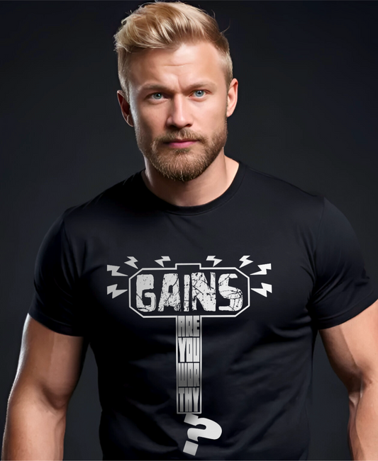 Athletic man wearing Thor inspired fitness themed t-shirt which reads: "Gains: Are You Worthy?" inside the silhouette of Mjolnir. 